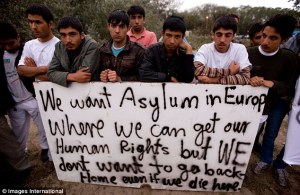 Faces of defiance and a despairing message as migrants prepare for the French onslaught on the Jungle